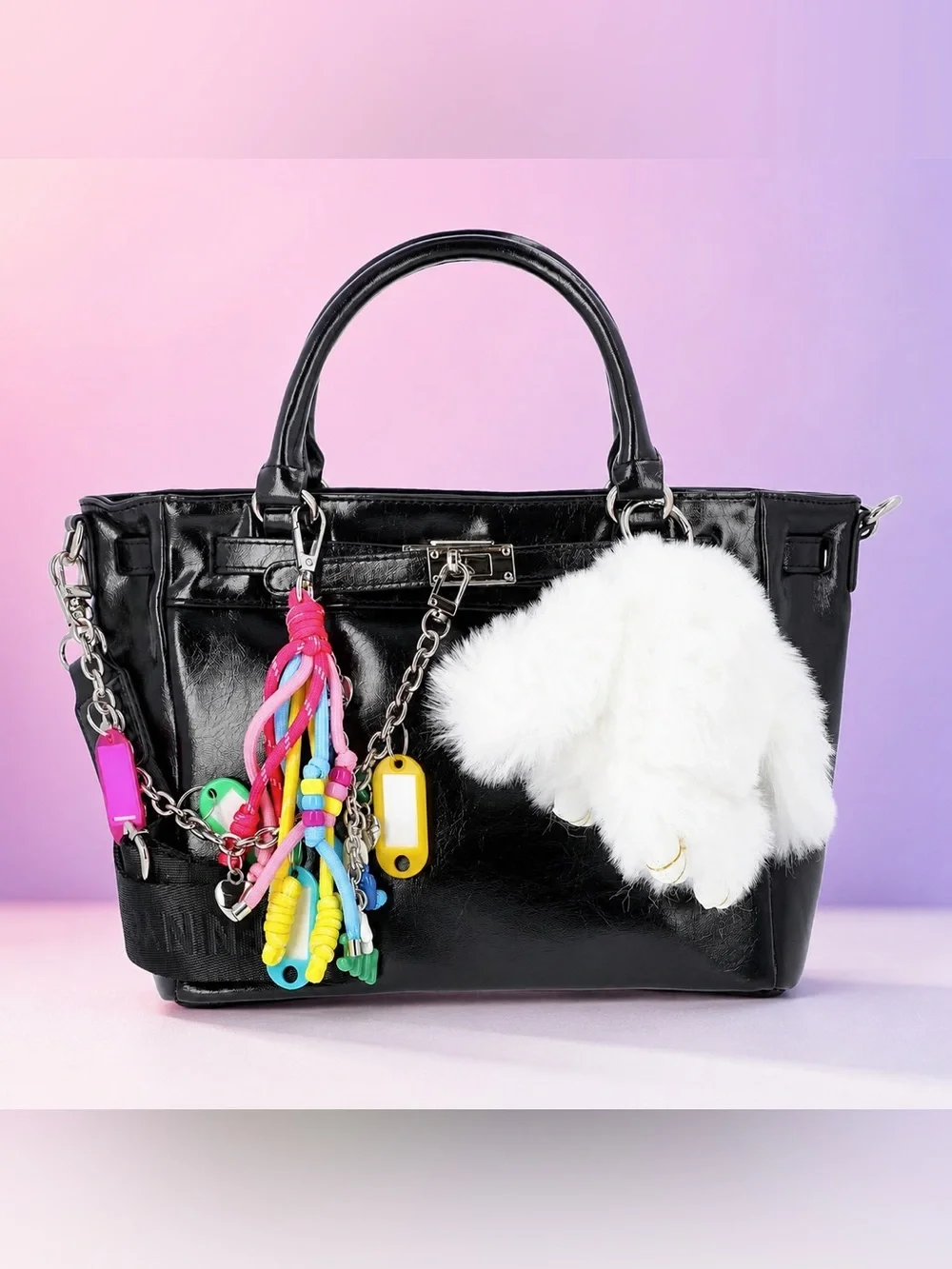 Black Patent Satchel with White Fur Charm and Colorful Tassel Accents